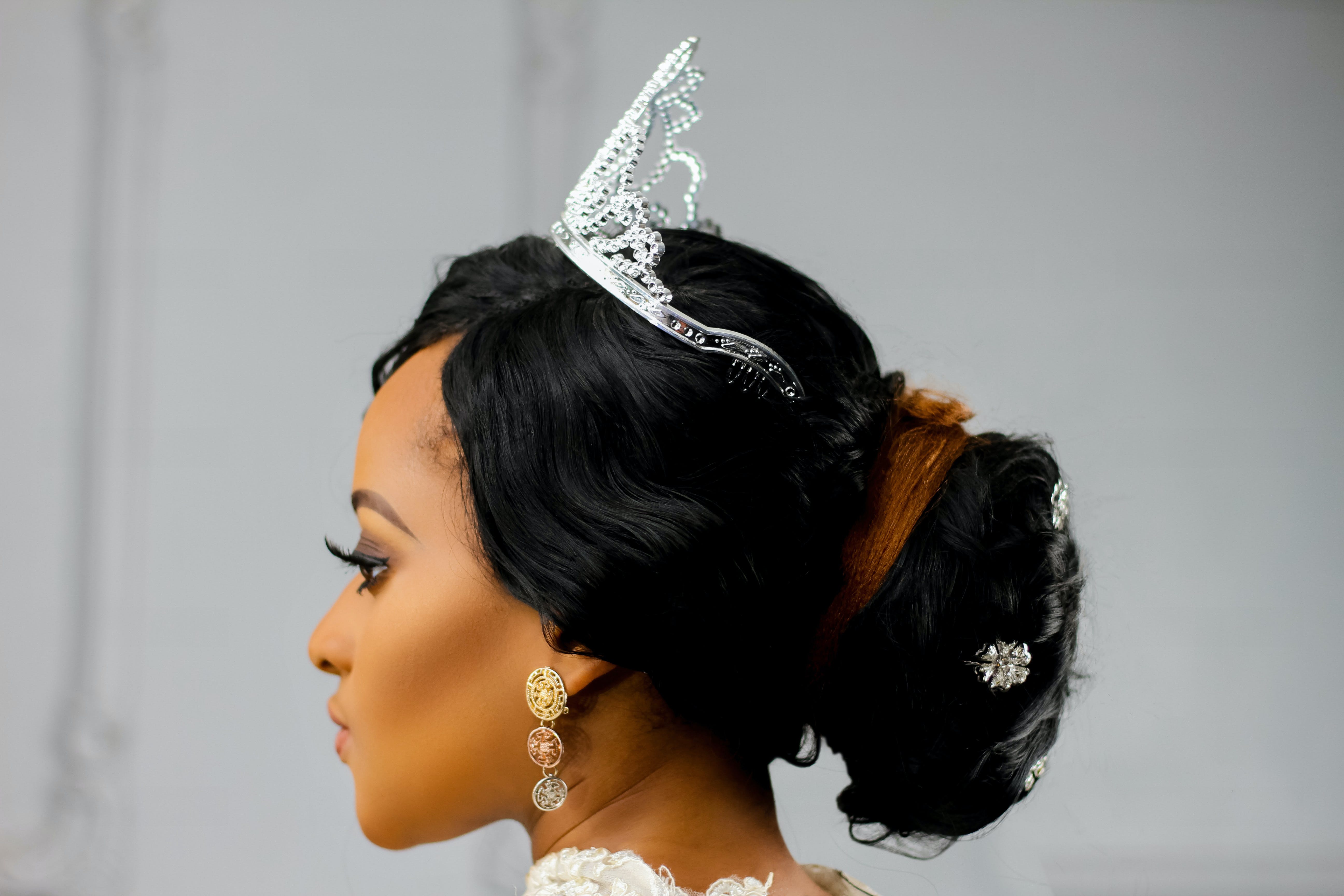 Woman Wearing Silver-colored Crown